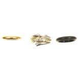 A Georg Jensen 'Magic' set of rings The principal ring in a coiled design with crossover