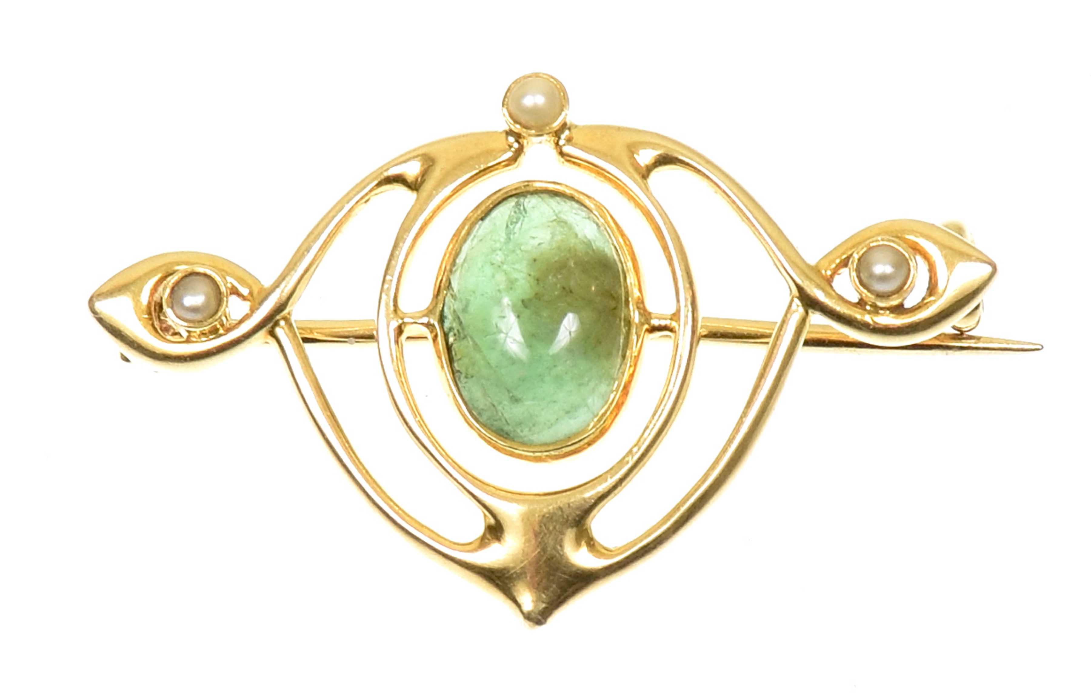 An early 20th Century Murrle Bennett & Co. 15ct gold emerald and split pearl brooch The oval emerald