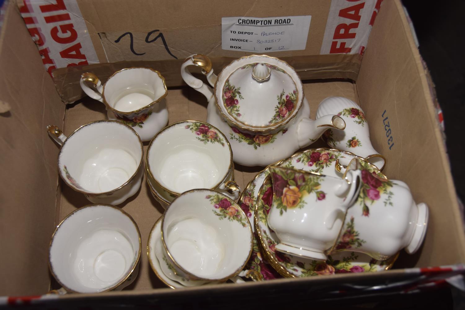 A Royal Albert tea service 23 items to include cups, saucers, milk jug and small teapot etc