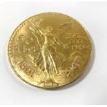 A Mexican gold 50 pesos dated 1947 Weight approx 41.6gms