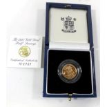 A Queen Elizabeth II cased gold proof half sovereign dated 1997 Together with certificate of issue