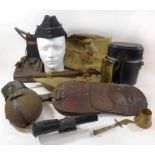 A collection of WWI and WWII military equipment To include three items of trench art, one in the