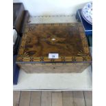 A Victorian walnut and mother of pearl inlaid rectangular box