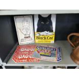 Four reproduction enamel advertising signs comprising OXO, Sunlight Soap, Black Cat Cigarettes and