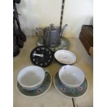 A mixed lot comprising a small iron clock face, modern Chinese cups and saucers, Players cigarette