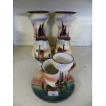 A collection of Torquay pottery vases, shaving mug and plate (6)