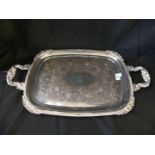 A good quality silver-plate on copper double handled serving tray with foliate decoration