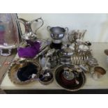 A collection of various silver-plated items to include tea wares, toast rack, various serving