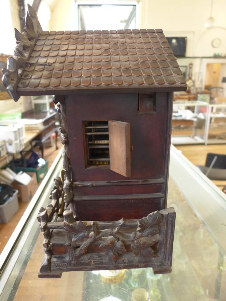 A Victorian Black Forest carved wood cuckoo mantle clock Carved with oak leaves, central butterfly - Image 2 of 19