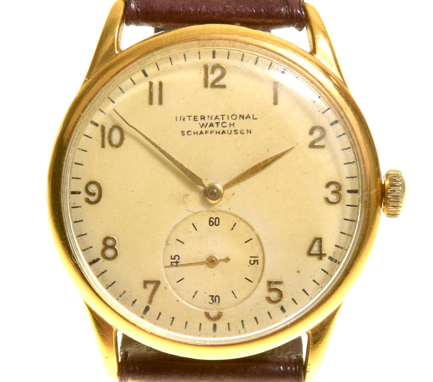 A mid 20th century IWC gold plated automatic wristwatch The circular cream dial with Arabic hour