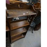 An early 20th Century Arts and crafts open bookcase.