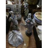 A collection of six various LLadro figures Including two Japanese figures, a young girl on a throne,