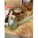 A galvanised watering can A Victorian copper kettle and 19th century bass skillet.
