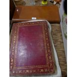 A red leather and gilt tooled family Bible Along with a Masonic apron.