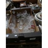 A large quantity of glassware Including decanters, cut glass bowls, sherry glasses, wine glasses,