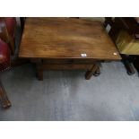 A rustic Fruitwood coffee table with a single frieze drawer and legs of square section.