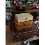 10 assorted cases to include a small leather attache cases and jewellery boxes.