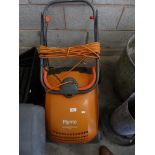 A Flymo lawnrake compact 340 electric lawnmower.