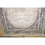 A Keshan carpet Decorated with floral design on a dark blue background, 2.8x2.0m