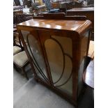 A 1930's Art deco walnut display cabinet.