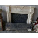 A painted composition Adams style fire surround With marble fire back and marble hearth.