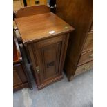 A Late Victorian walnut pot cupboard.