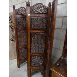 A hardwood and brass inlaid openwork three fold room screen