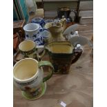 A collection of decorative ceramics To include a Crown Devon 'On Ilke Moor' tankard a Royal