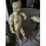 A reconstituted stone garden ornament modelled as a classical male nude.