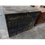 A mid-20th Century painted metal military issue spare parts cabinet