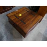 A contemporary hardwood box coffee table Applied with iron embellishments