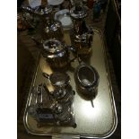 A Victorian five piece semi lobed plated tea service Along with a four bottle cruet.