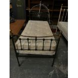 A painted Victorian iron and brass embellished single bed by Seventh Heaven to include mattress