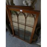 A set of four glazed mahogany bookcase doors.