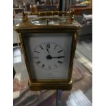 An early 20th century brass cased repeating carriage clock by F Flower, London.