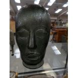 An unusual coloured moulded glass human mask.