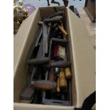 A large collection of vintage woodworking tools To include chisels, wheelwrights instruments and