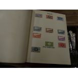A collection of stamp albums To include assorted world stamps from various nations.