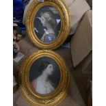 Two gilt oval framed prints Depicting angelic looking ladies. (2)
