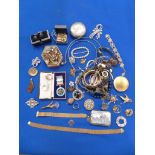 A selection of costume jewellery To include necklaces, brooches, cufflinks, a silver gilt medal,
