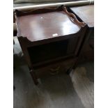A Georgian mahogany commode night stand with a tambour front.
