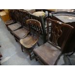 Three country Chippendale style dining chairs and a pair of late 19th Century oak kitchen chairs. (