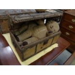 A 19th Century studded leather domed trunk and a collection of vintage Teddy bears.