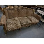 A Louis XVI style gilt wood and gesso three seater settee, early 20th Century The settee frame