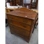 An early 20th Century walnut chest of 4 long drawers.