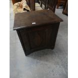 An 18th Century and later oak cabinet with a single door.