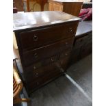 A Stag tall chest of drawers With arrangement of four long and three short drawers