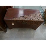 A late 19th, early 20th Century Chinese carved camphor chest The chest carved in deep relief with
