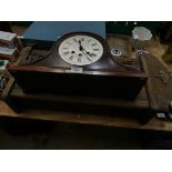 A Napoleon hat mantel clock and a wall clock.