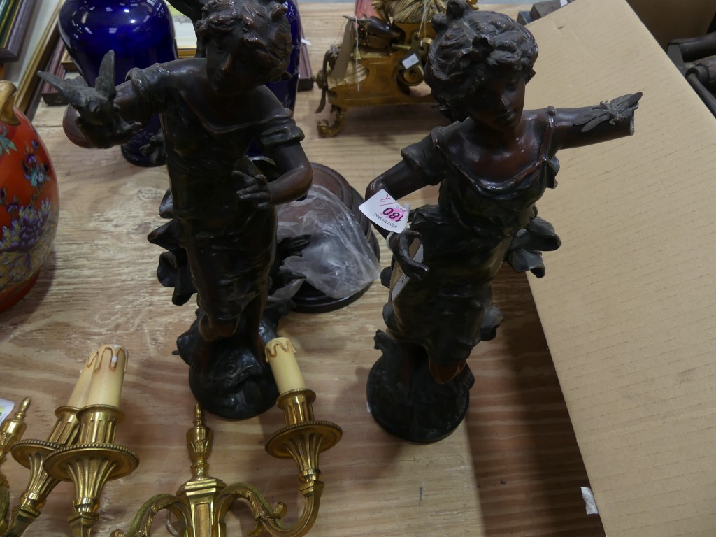 A pair of French cast metal and patinated figures after Moreau Each depicting a classical